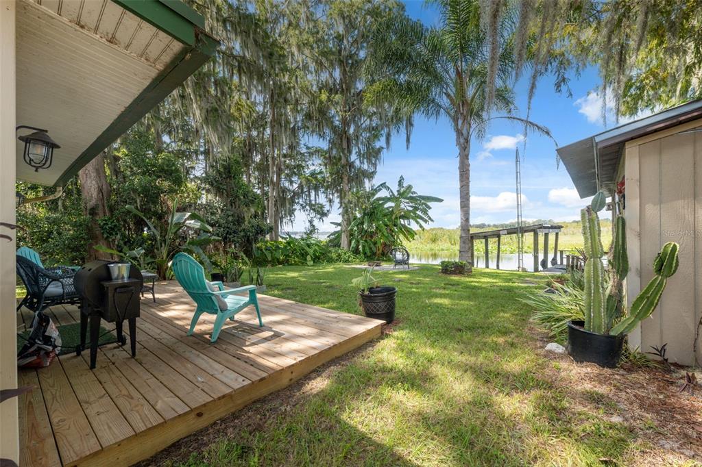 7965 West Riverbend Road Crystal River, FL 34428 - Photo 40 of 60 a view of a park with plants and a bench