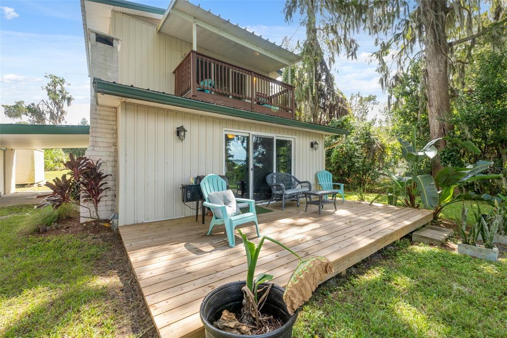 7965 West Riverbend Road Crystal River, FL 34428 - Photo 43 of 60 a view of a house with backyard porch and sitting area