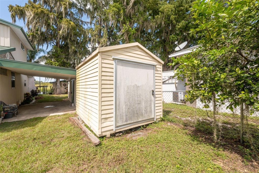 7965 West Riverbend Road Crystal River, FL 34428 - Photo 45 of 60 a view of a house with a yard