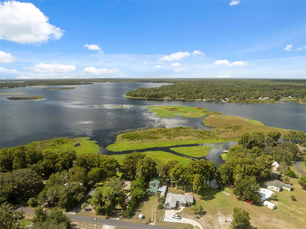 7965 West Riverbend Road Crystal River, FL 34428 - Photo 52 of 60 a view of a lake with a mountain