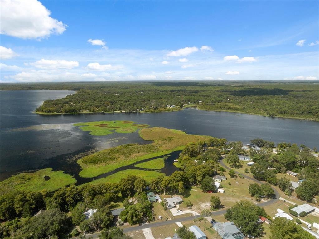7965 West Riverbend Road Crystal River, FL 34428 - Photo 55 of 60 a view of a lake with a beach