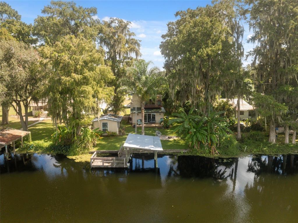 7965 West Riverbend Road Crystal River, FL 34428 - Photo 56 of 60 a small pool with trees in front of it