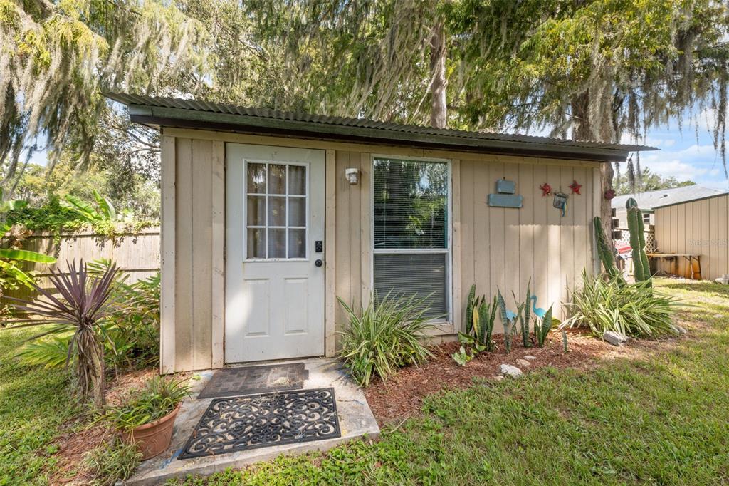 7965 West Riverbend Road Crystal River, FL 34428 - Photo 10 of 60 a front view of a house with garden