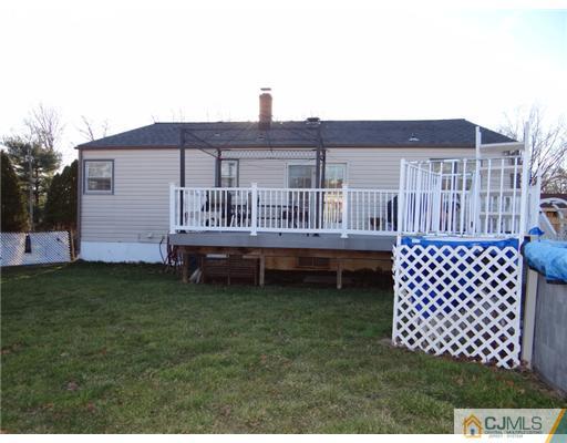 8 Brox Road Edison, NJ 08817 - Photo 14 of 19 a house view with a garden space