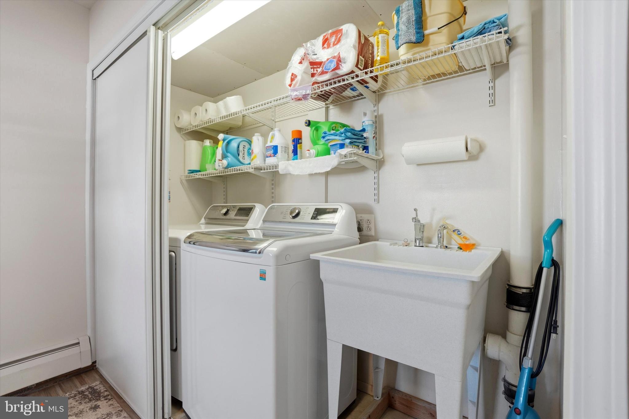 28 Sycamore Road Levittown, PA 19056 - Photo 17 of 31 a room with storage and utility