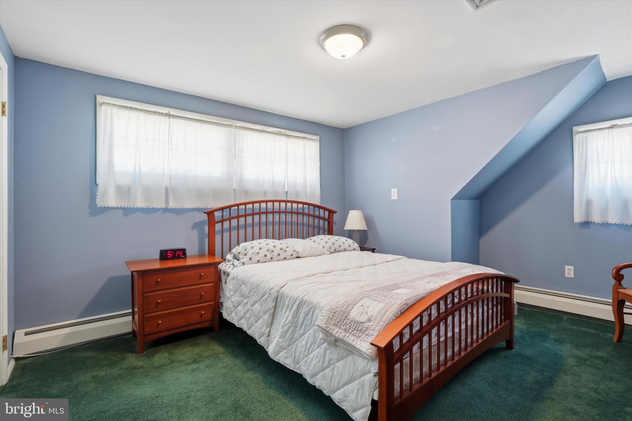 28 Sycamore Road Levittown, PA 19056 - Photo 18 of 31 a bedroom with a bed and a window