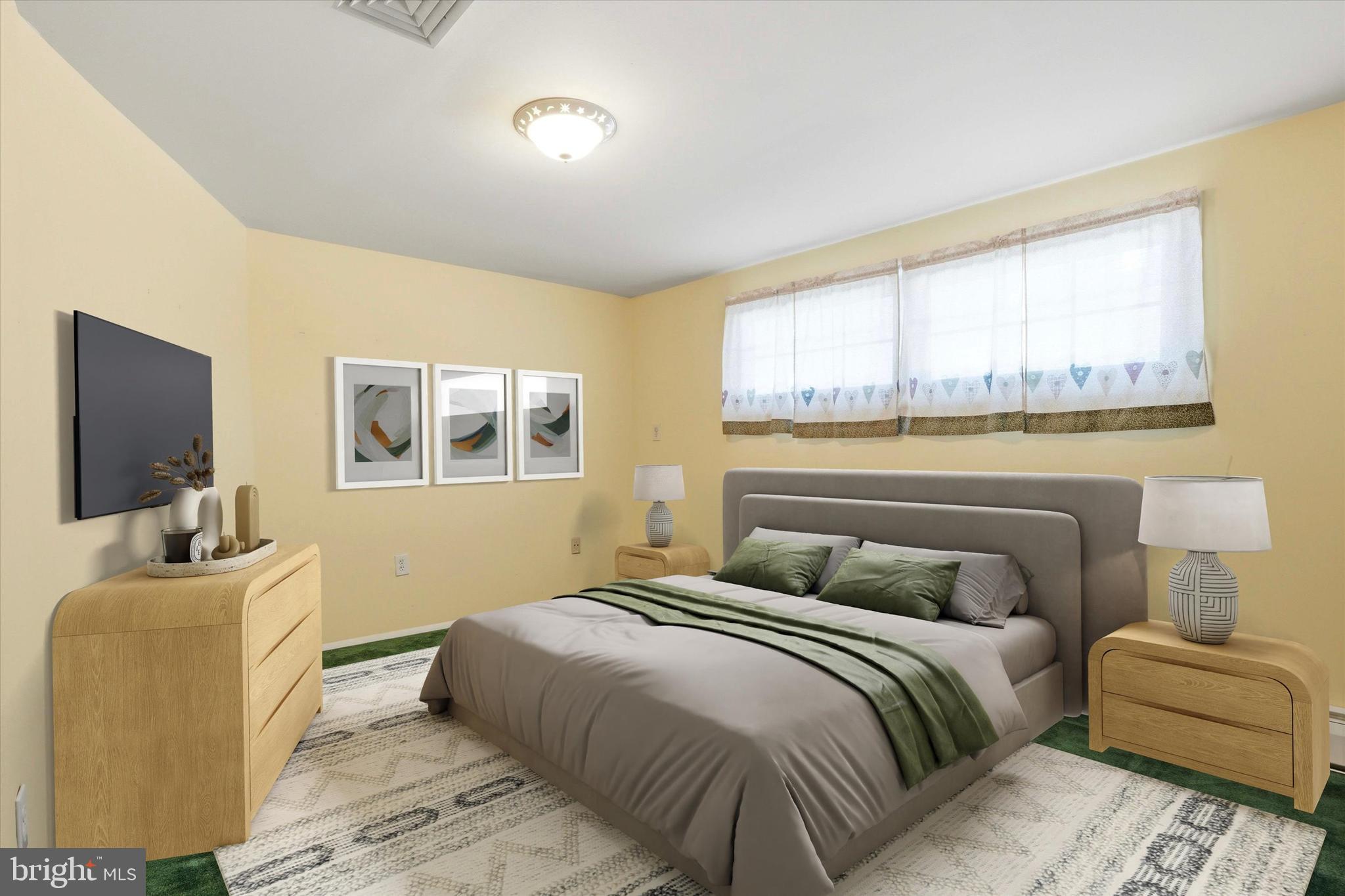 28 Sycamore Road Levittown, PA 19056 - Photo 19 of 31 a bedroom with a bed and a couch