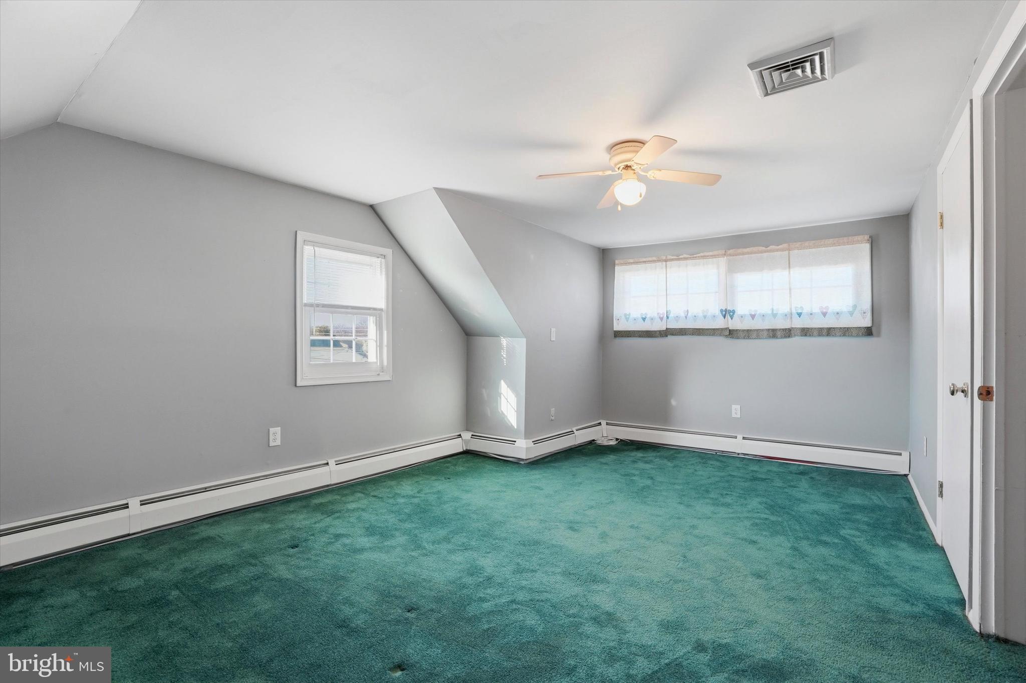 28 Sycamore Road Levittown, PA 19056 - Photo 22 of 31 wooden floor in an empty room with a window