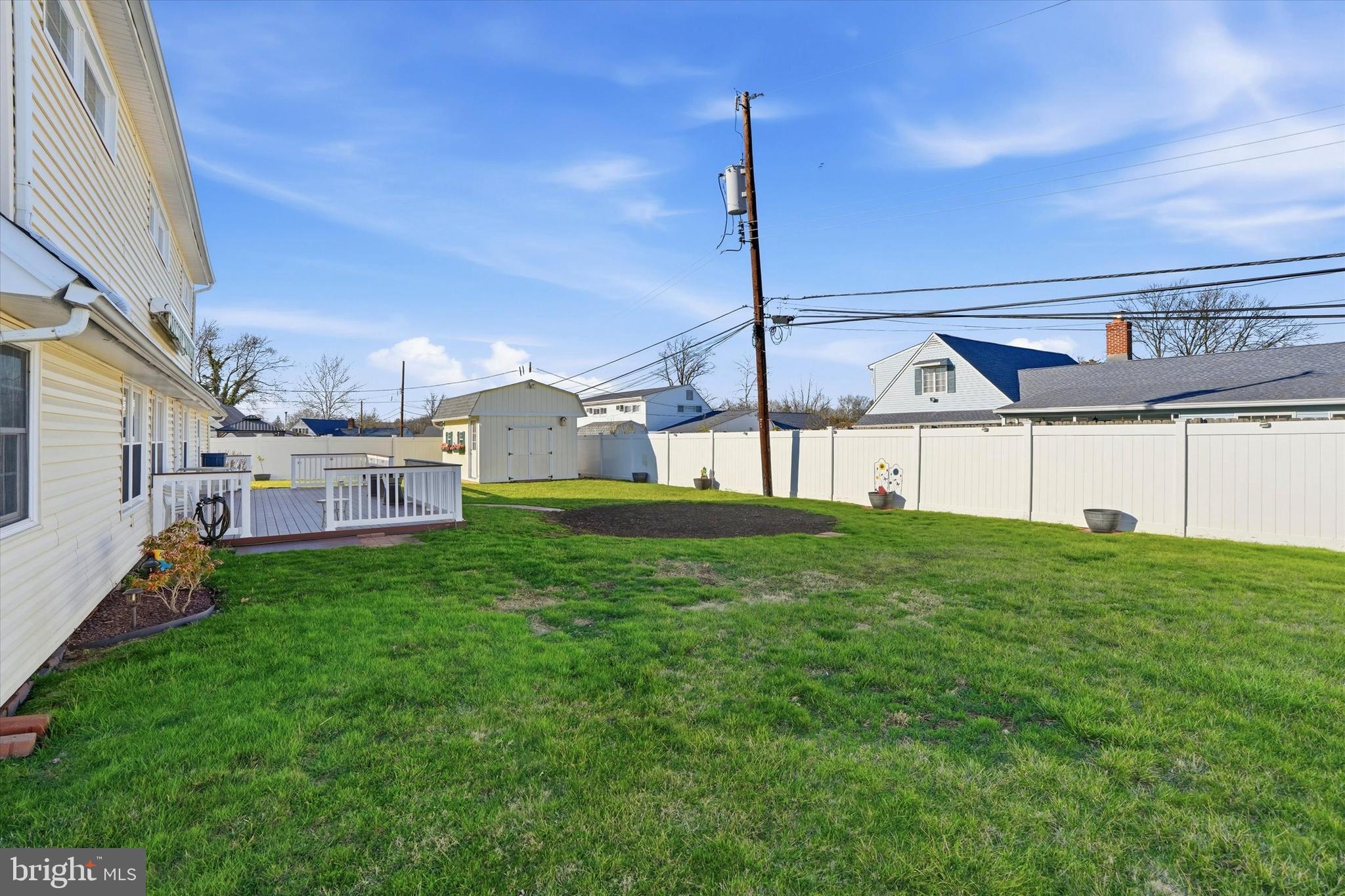 28 Sycamore Road Levittown, PA 19056 - Photo 26 of 31 a view of an house with backyard and deck