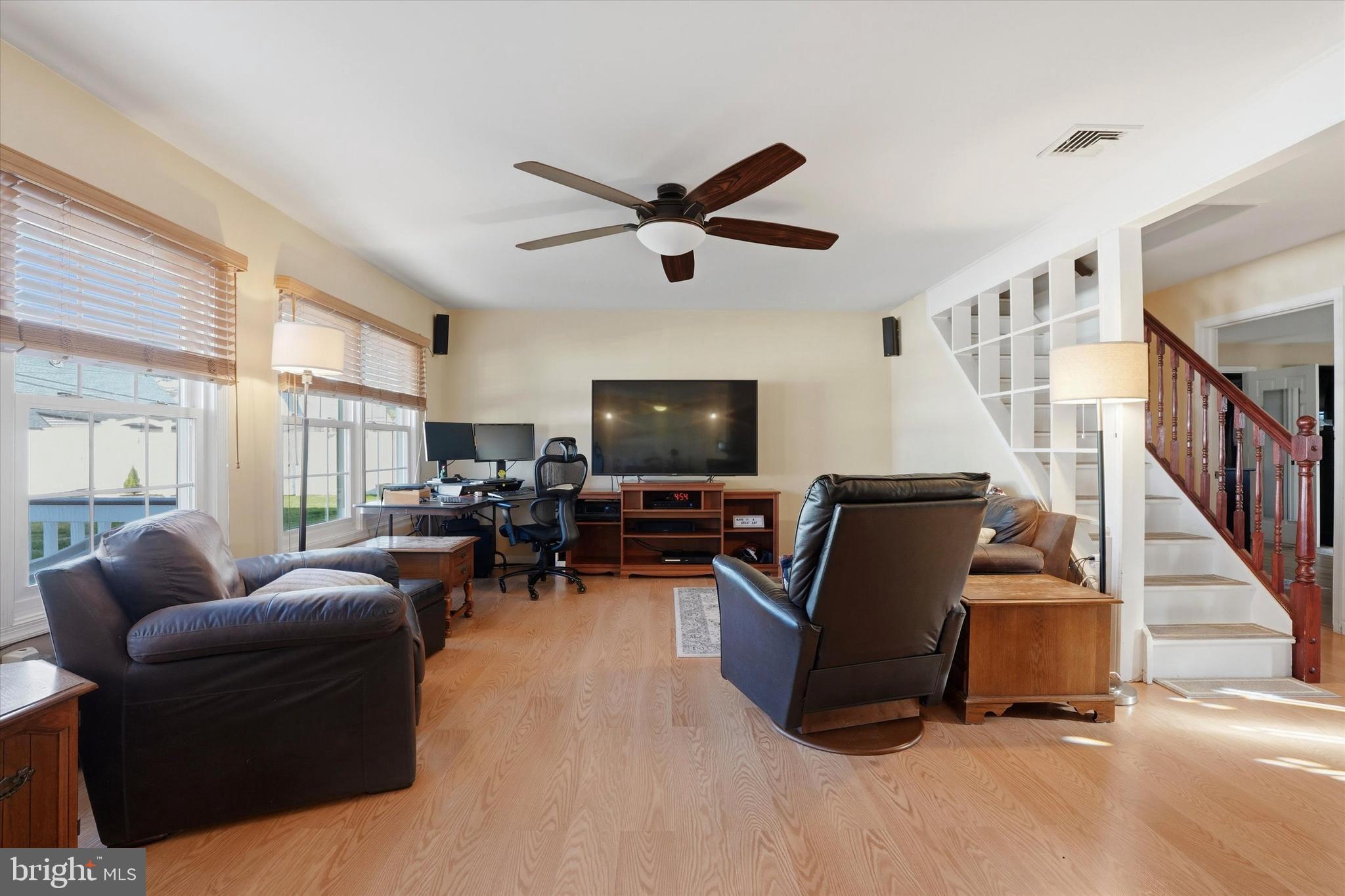 28 Sycamore Road Levittown, PA 19056 - Photo 3 of 31 a living room with furniture and a flat screen tv
