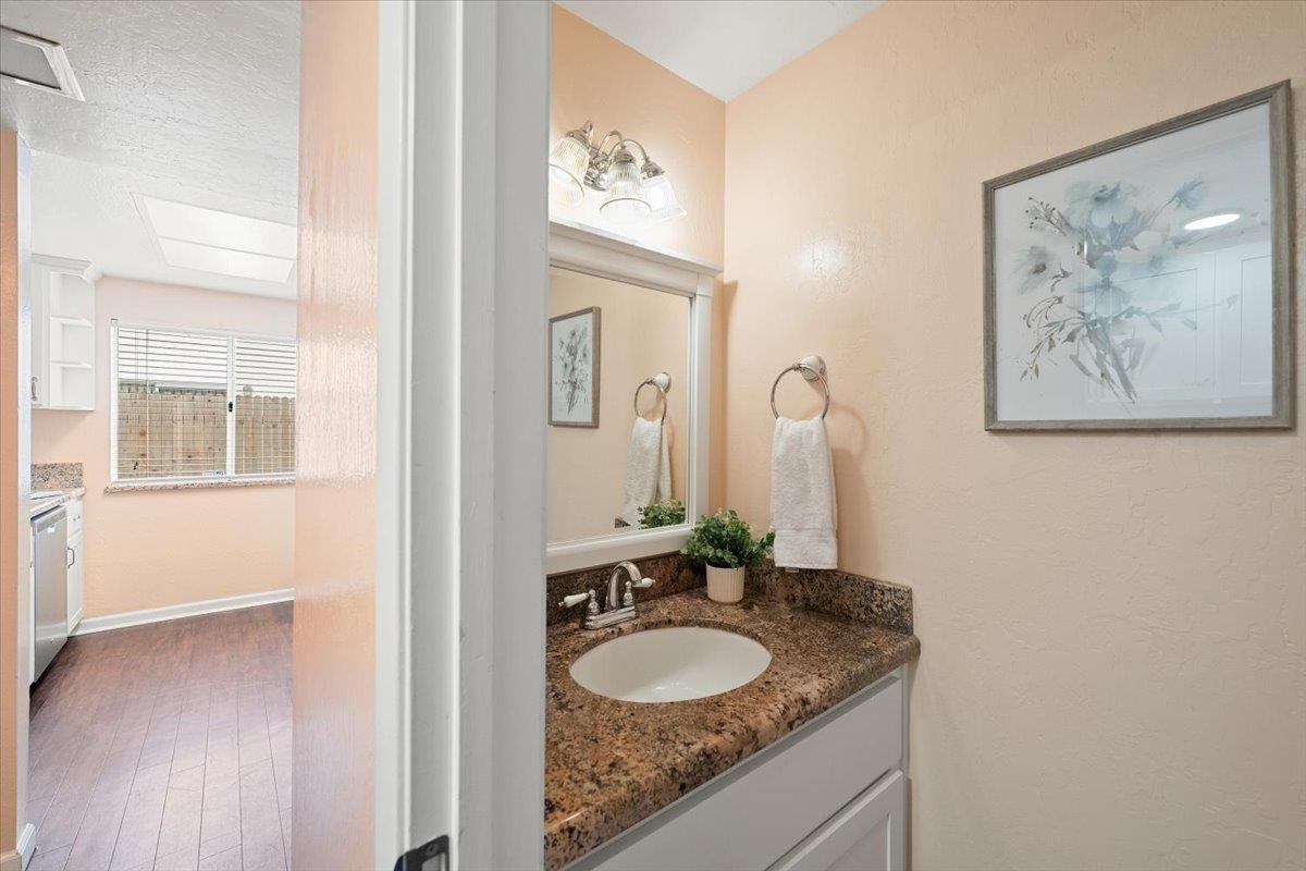 10919 Coloma Road, Unit 2 Rancho Cordova, CA 95670 - Photo 20 of 34 Half bathroom downstairs next to kitchen.