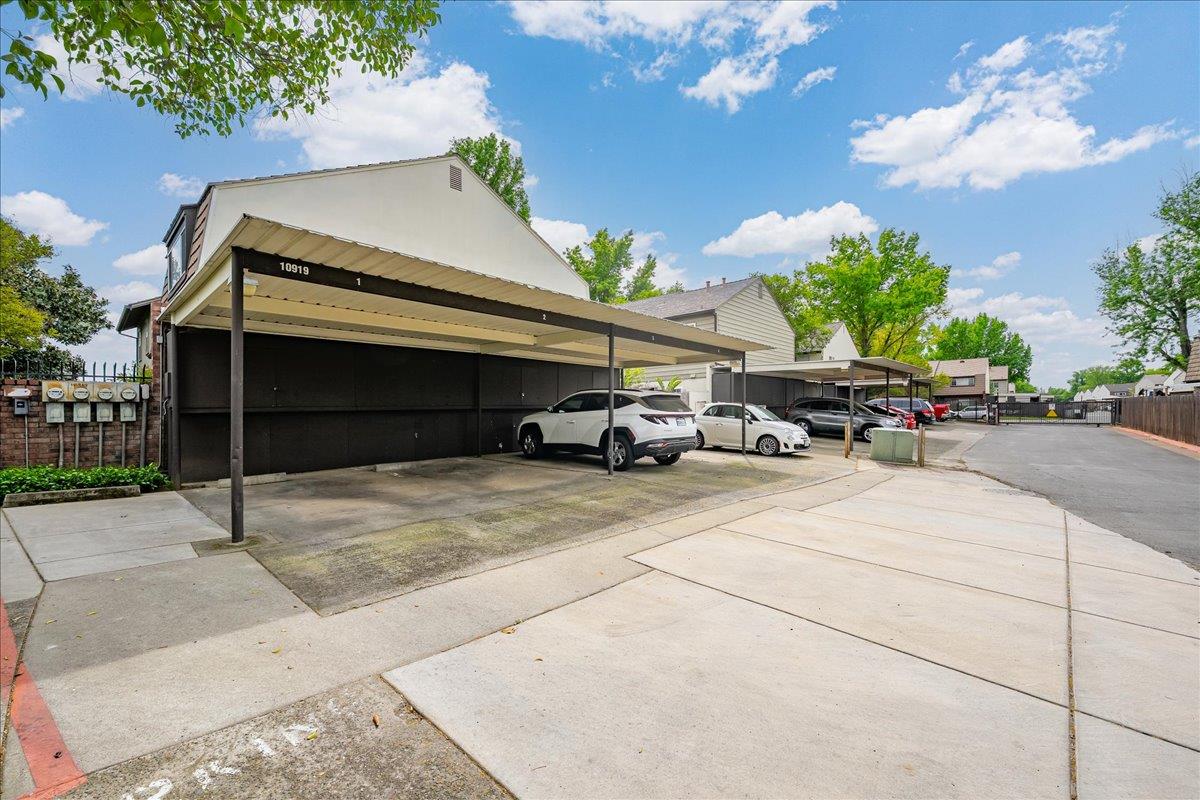 10919 Coloma Road, Unit 2 Rancho Cordova, CA 95670 - Photo 32 of 34 Designated covered parking spot behind gated parking area.