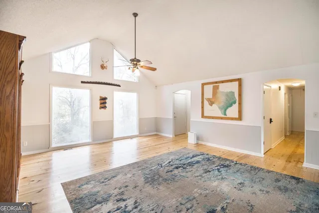 a view of an empty room and window