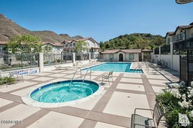 a view of a house with a swimming pool