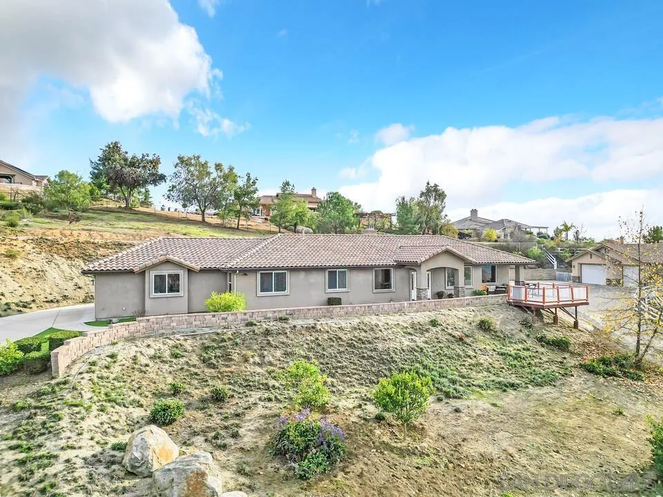 352 Sneath Way Alpine, CA 91901 - Photo 3 of 50 a view of a house with a yard
