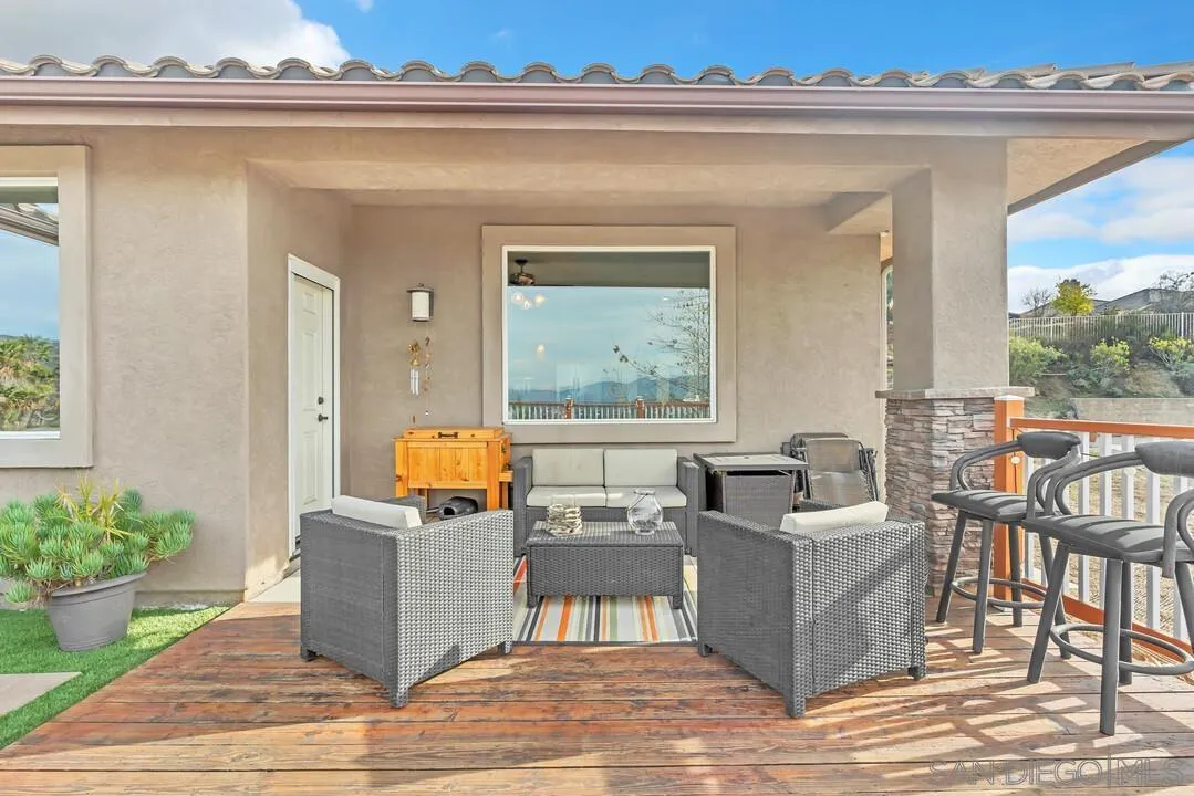 352 Sneath Way Alpine, CA 91901 - Photo 34 of 50 a living room with furniture and a potted plant