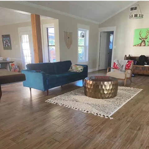 a living room with furniture and a couch
