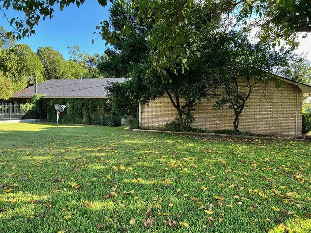 a view of a backyard with a garden