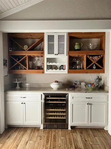 a kitchen with a stove and cabinets