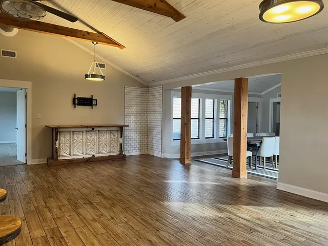 a view of an empty room and window