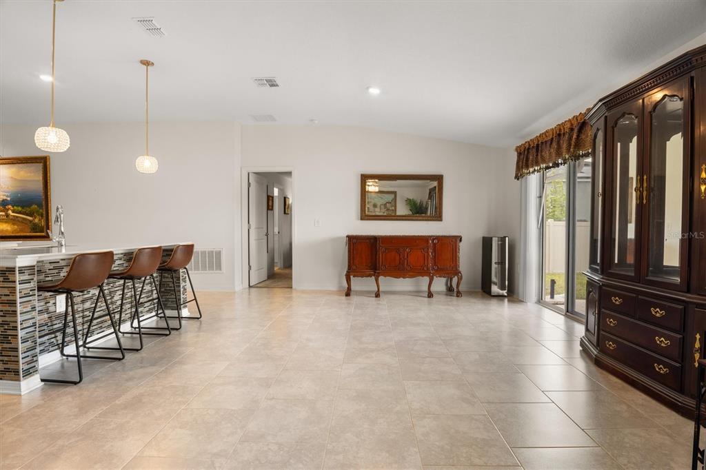 287 Inman Boulevard Winter Haven, FL 33881 - Photo 14 of 36 a view of kitchen with furniture and window