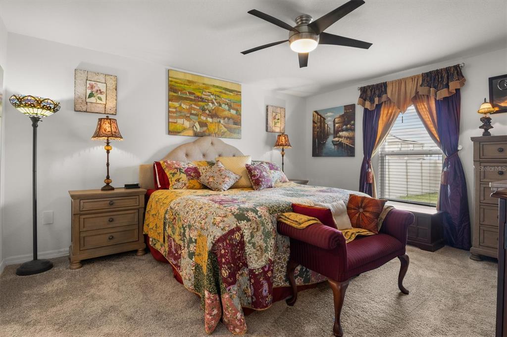 287 Inman Boulevard Winter Haven, FL 33881 - Photo 19 of 36 a bedroom with bed and window