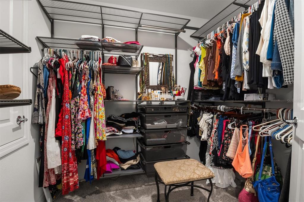 287 Inman Boulevard Winter Haven, FL 33881 - Photo 23 of 36 a view of walk in closet with clothes