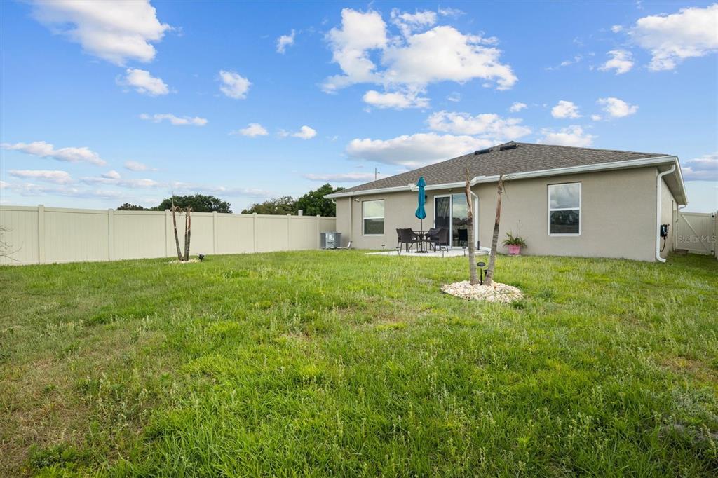 287 Inman Boulevard Winter Haven, FL 33881 - Photo 26 of 36 a front view of house with yard and porch