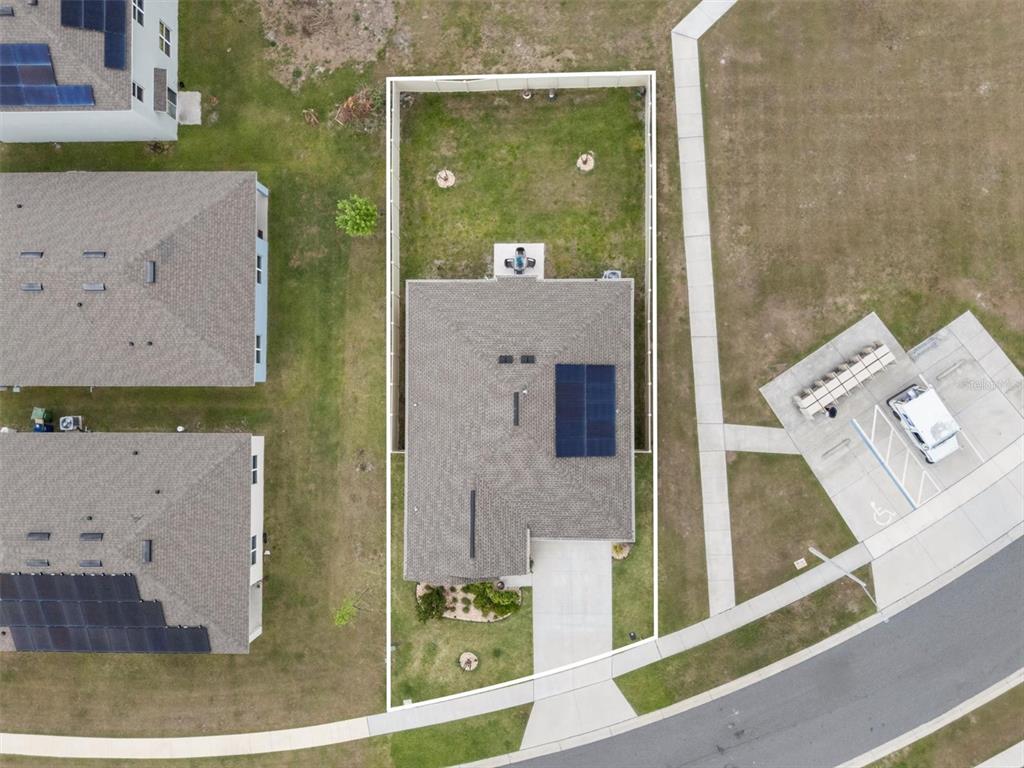 287 Inman Boulevard Winter Haven, FL 33881 - Photo 30 of 36 an aerial view of a house with a swimming pool