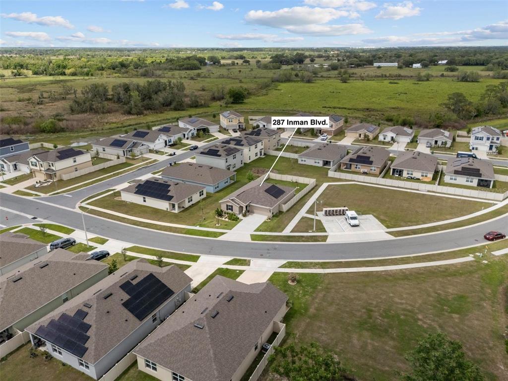 287 Inman Boulevard Winter Haven, FL 33881 - Photo 32 of 36 an aerial view of a house with a ocean view