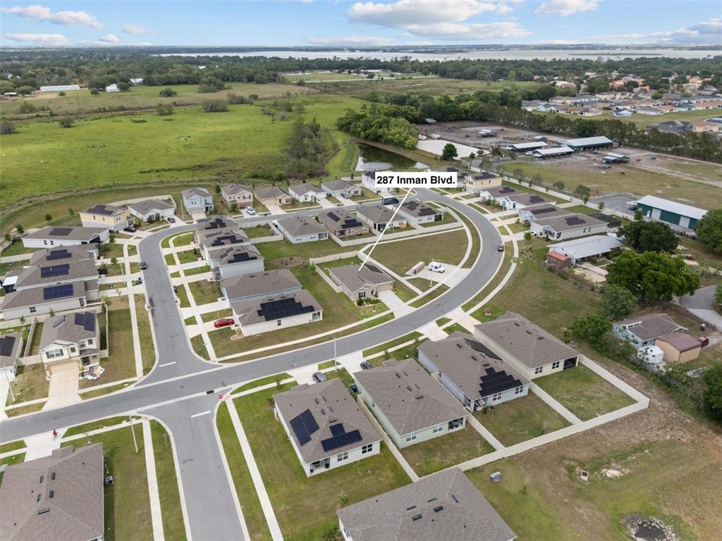 287 Inman Boulevard Winter Haven, FL 33881 - Photo 34 of 36 an aerial view of a house with outdoor space