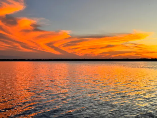 a view of a lake with a mountain view