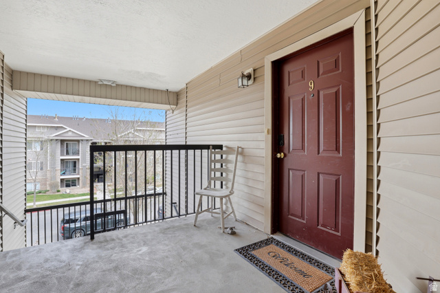 8083 North Ridge Loop East, Unit I 9 Eagle Mountain, UT 84005 - Photo 3 of 17 Doorway to property with a porch