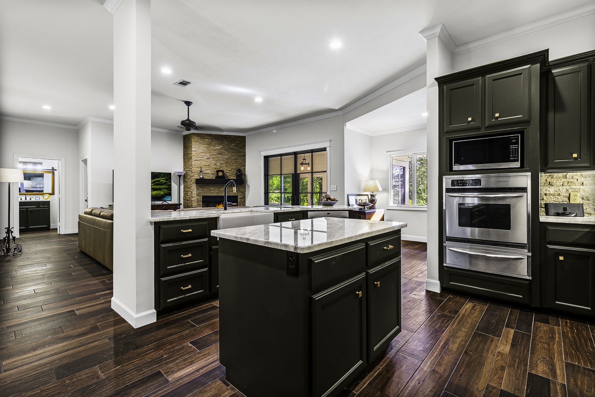 1387 Barrett's Landing Road Trinity, TX 75862 - Photo 13 of 50 a kitchen with stainless steel appliances granite countertop a stove and a refrigerator