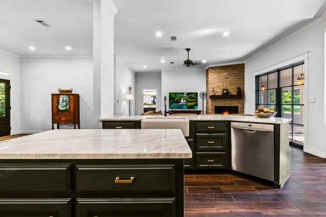 a kitchen with a stove and a sink