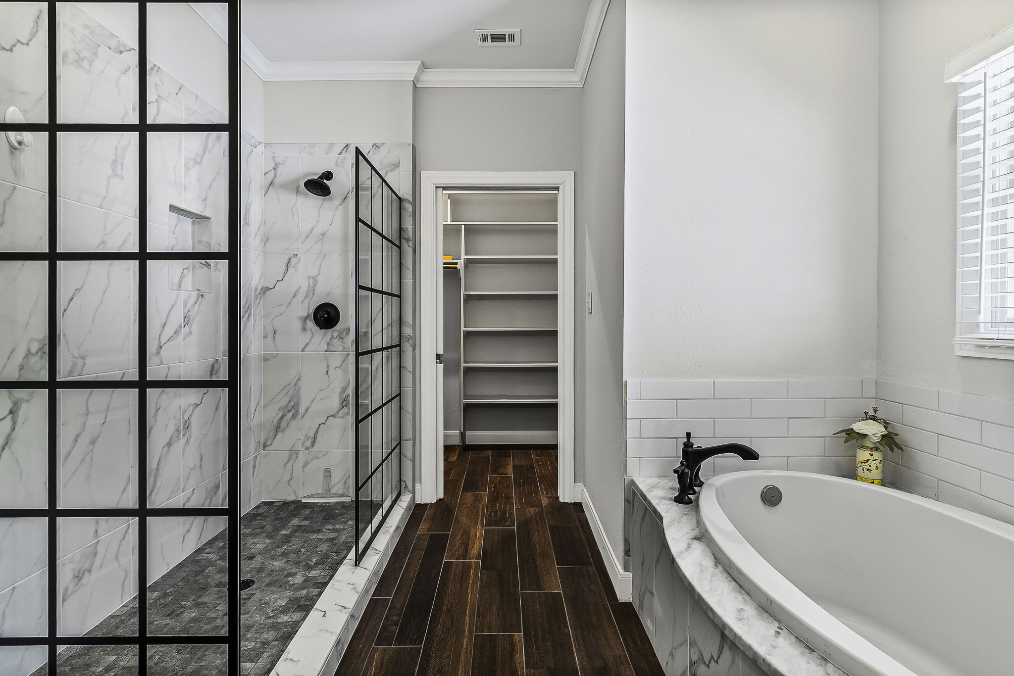 1387 Barrett's Landing Road Trinity, TX 75862 - Photo 25 of 50 a bathroom with a bathtub and a shower