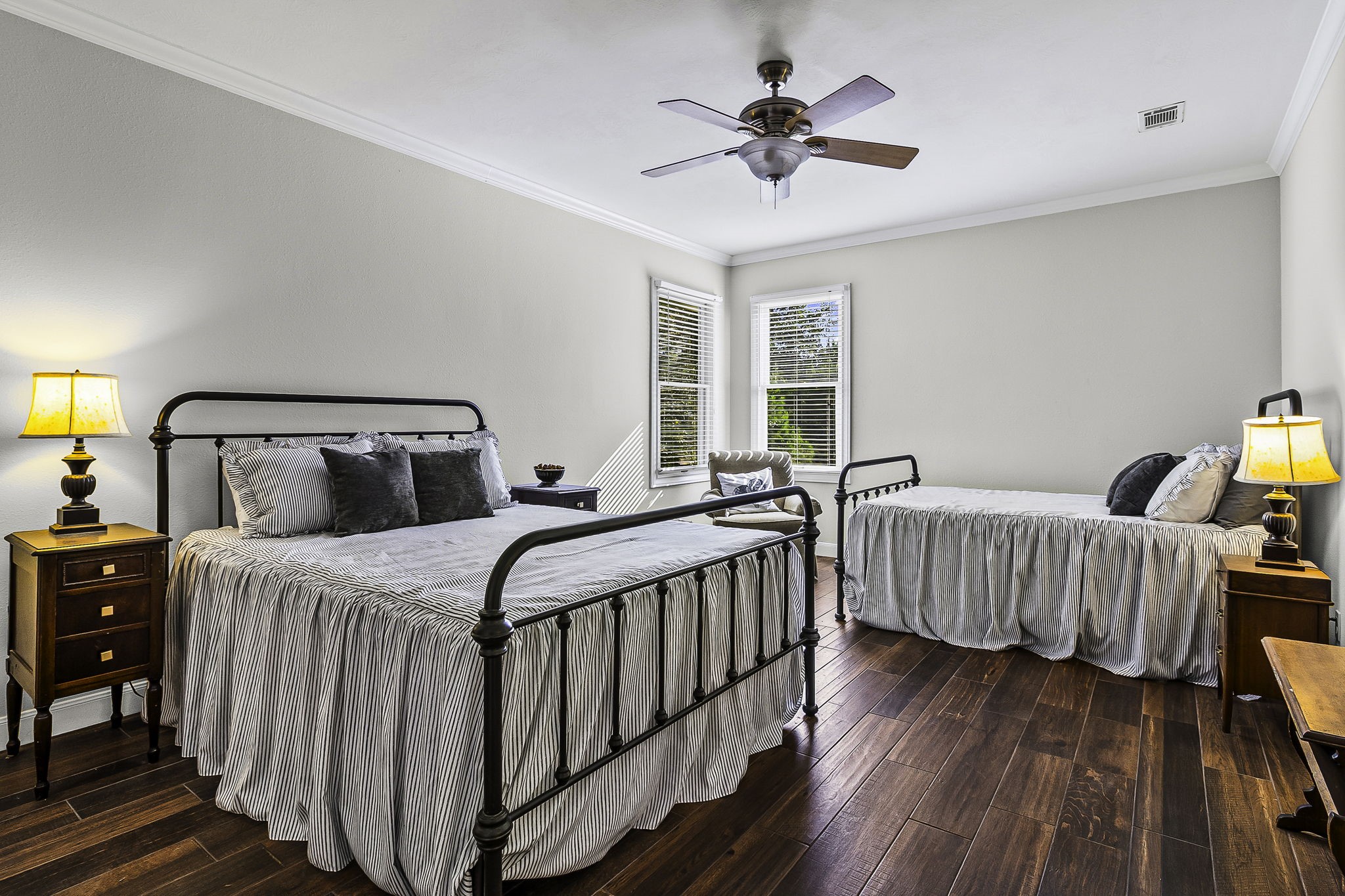 1387 Barrett's Landing Road Trinity, TX 75862 - Photo 27 of 50 a bedroom with three beds and wooden floor