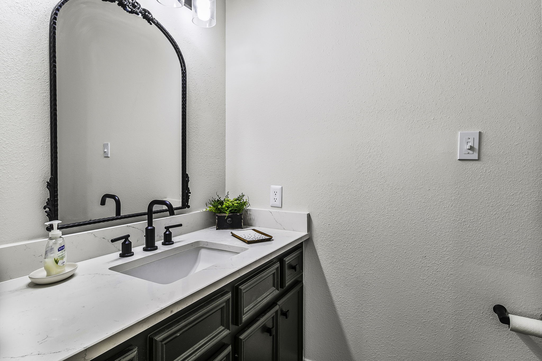 1387 Barrett's Landing Road Trinity, TX 75862 - Photo 29 of 50 a bathroom with a sink and a mirror