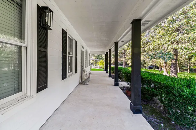 a view of a garden from a porch