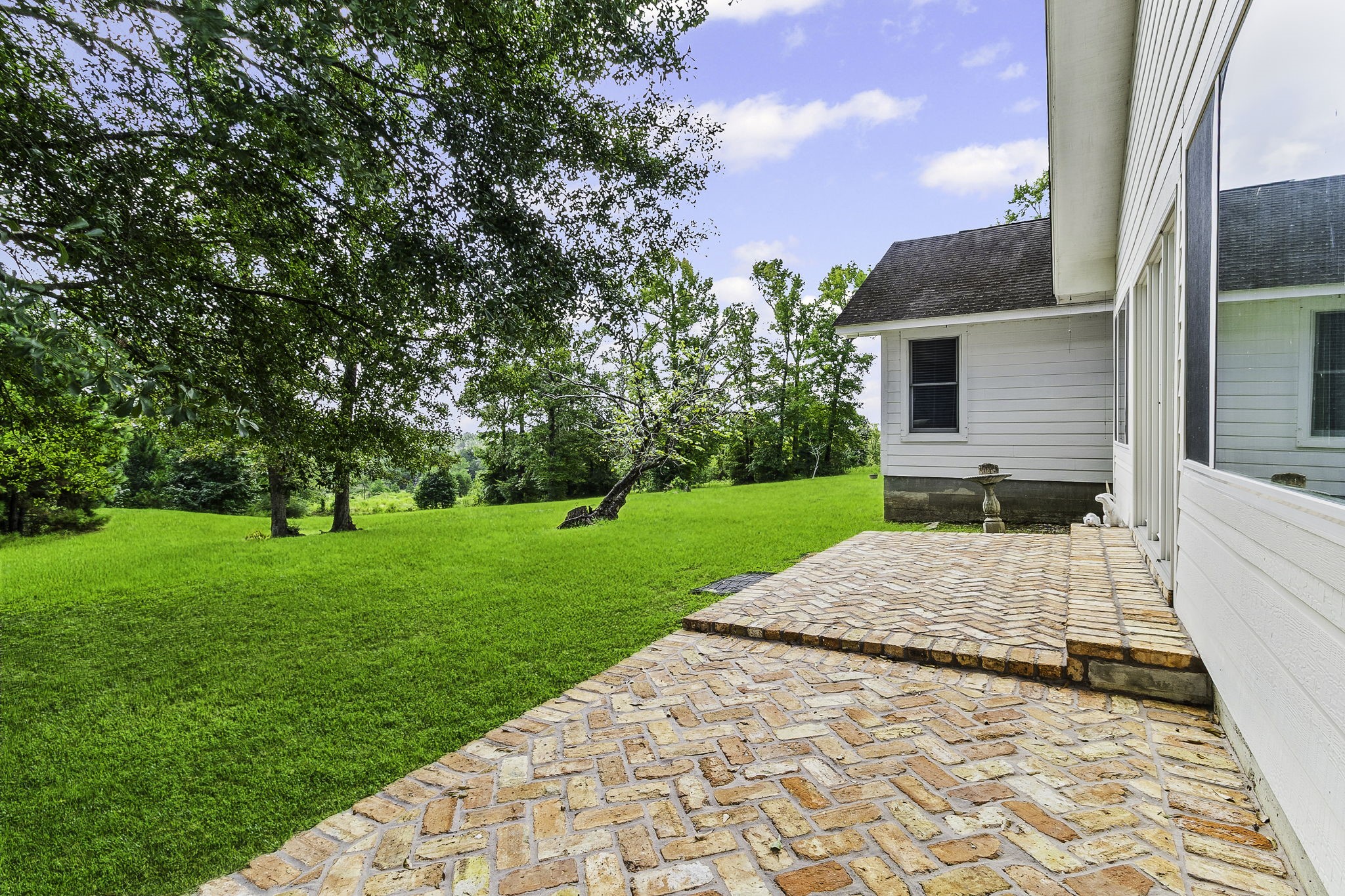 1387 Barrett's Landing Road Trinity, TX 75862 - Photo 31 of 50 a view of a house with a yard