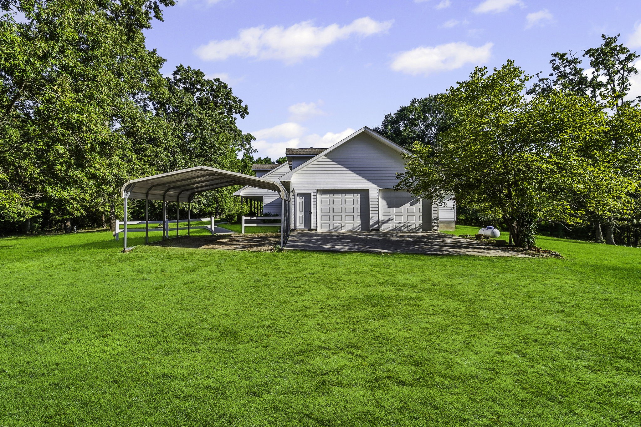 1387 Barrett's Landing Road Trinity, TX 75862 - Photo 32 of 50 a view of a house with a yard