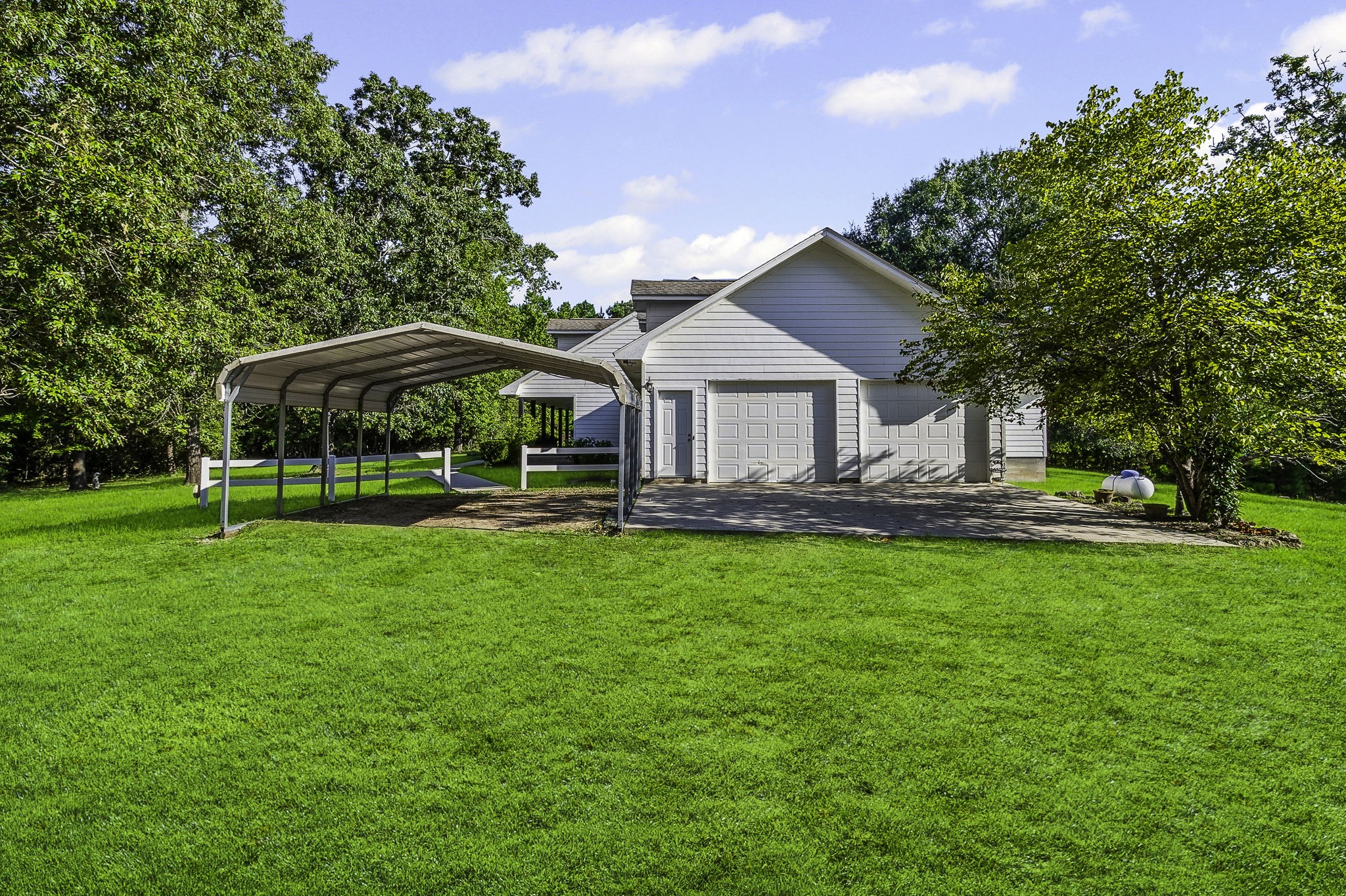 1387 Barrett's Landing Road Trinity, TX 75862 - Photo 33 of 50 a view of a house with a yard