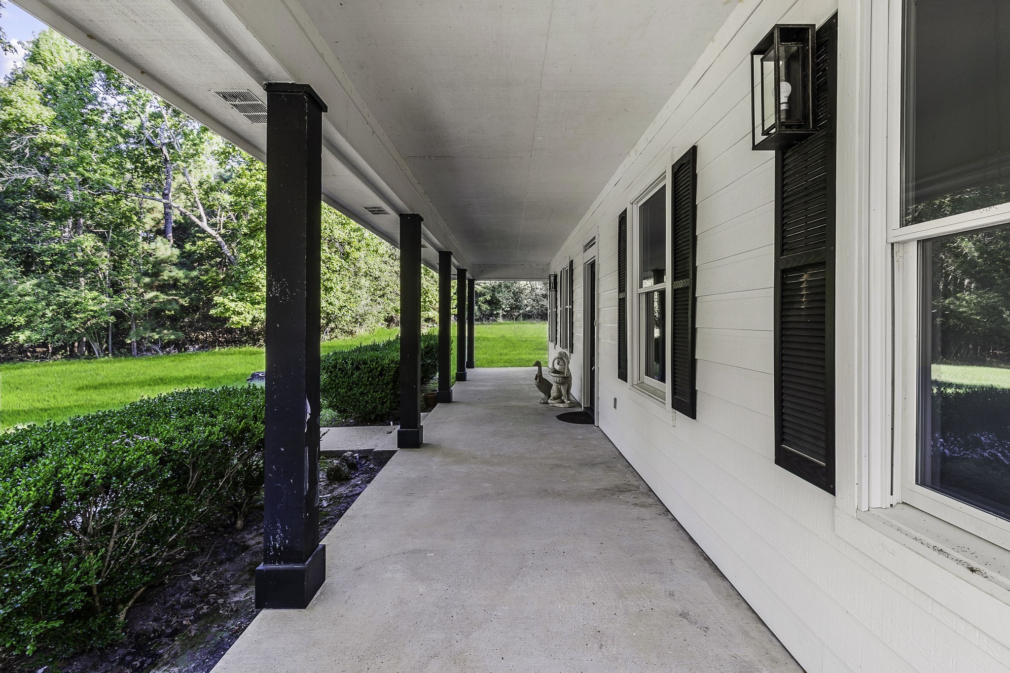 1387 Barrett's Landing Road Trinity, TX 75862 - Photo 4 of 50 a view of a house with backyard and porch