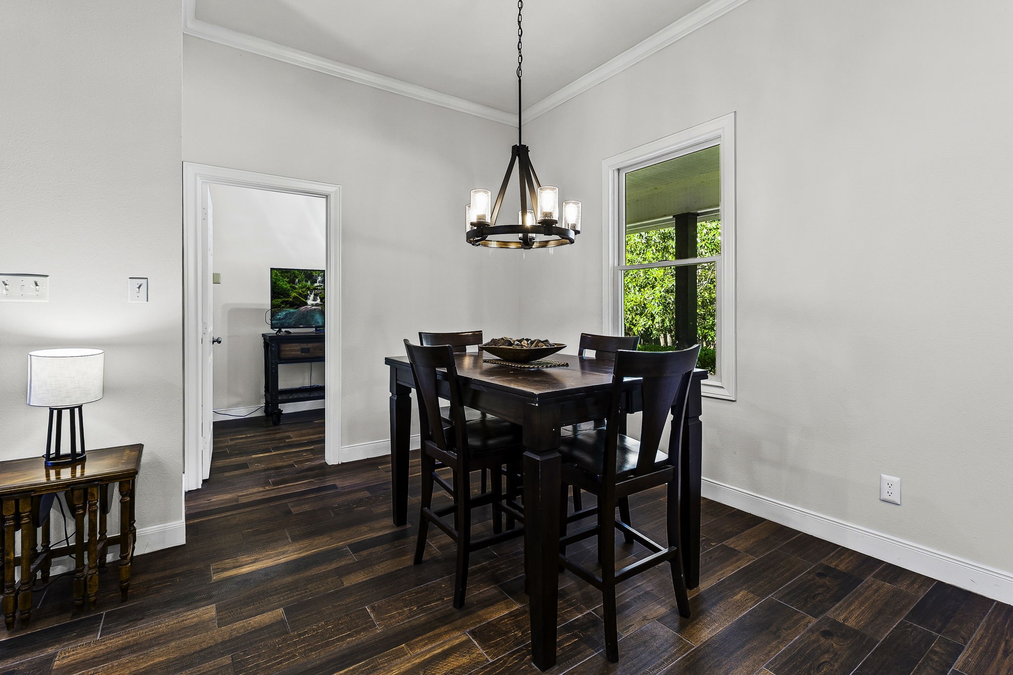 1387 Barrett's Landing Road Trinity, TX 75862 - Photo 6 of 50 a dining room with furniture a chandelier and wooden floor