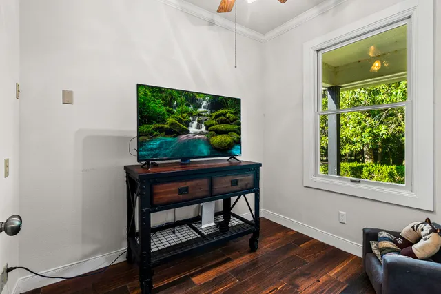 a living room with furniture and a window