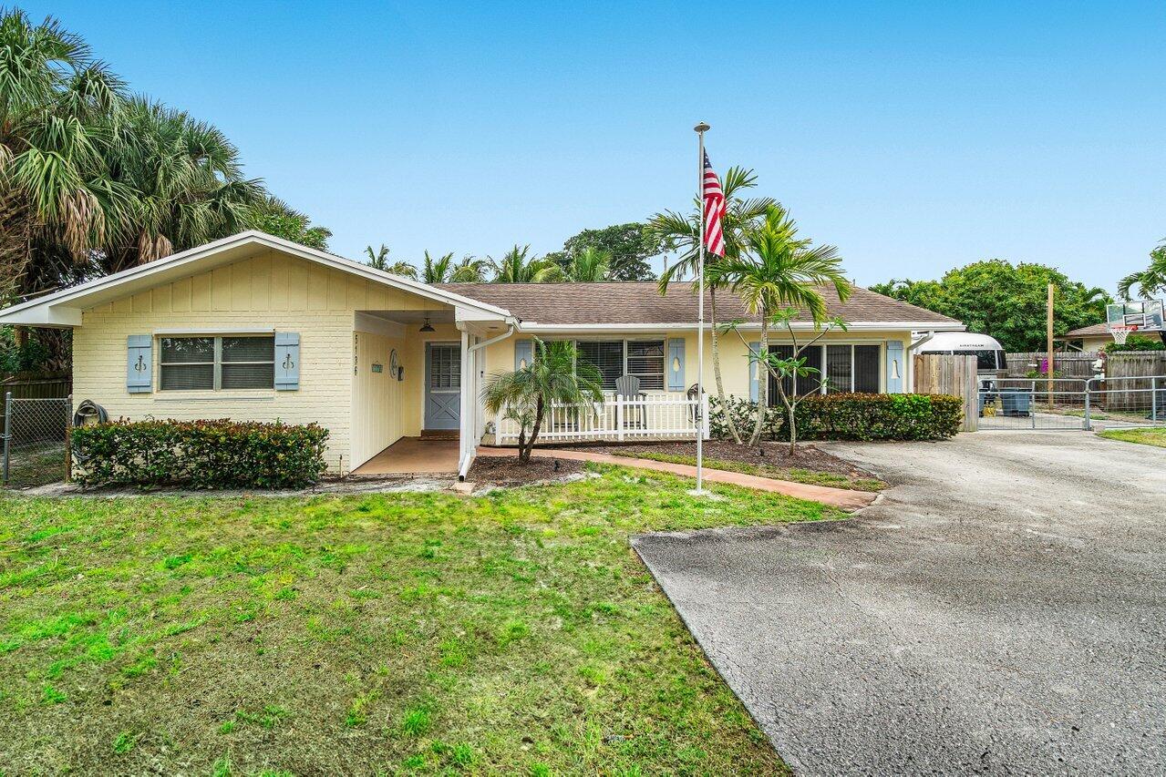 5136 Laird Lane Jupiter, FL 33458 - Photo 1 of 45 002-5136LairdLane-Jupiter-FL-33458-SMALL
