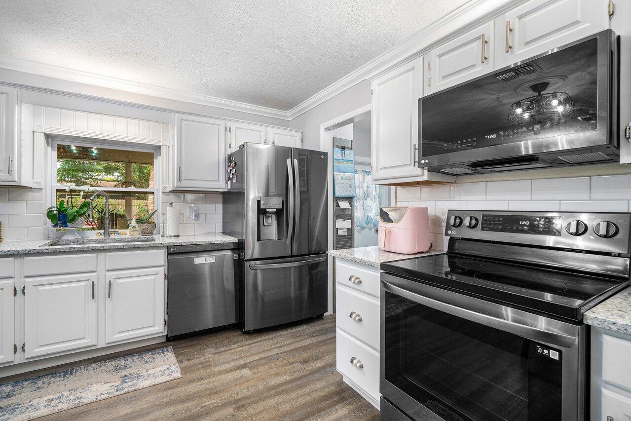 5136 Laird Lane Jupiter, FL 33458 - Photo 8 of 45 011-5136LairdLane-Jupiter-FL-33458-SMALL