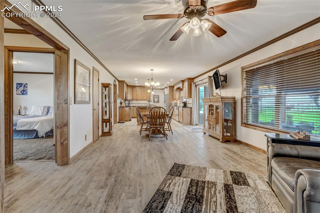 21445 Scott Road Calhan, CO 80808 - Photo 12 of 50 a living room with furniture and a wooden floor