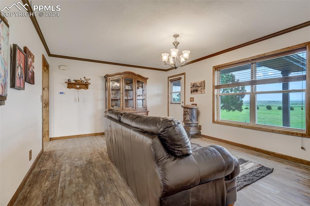 21445 Scott Road Calhan, CO 80808 - Photo 17 of 50 a living room with furniture and a large window