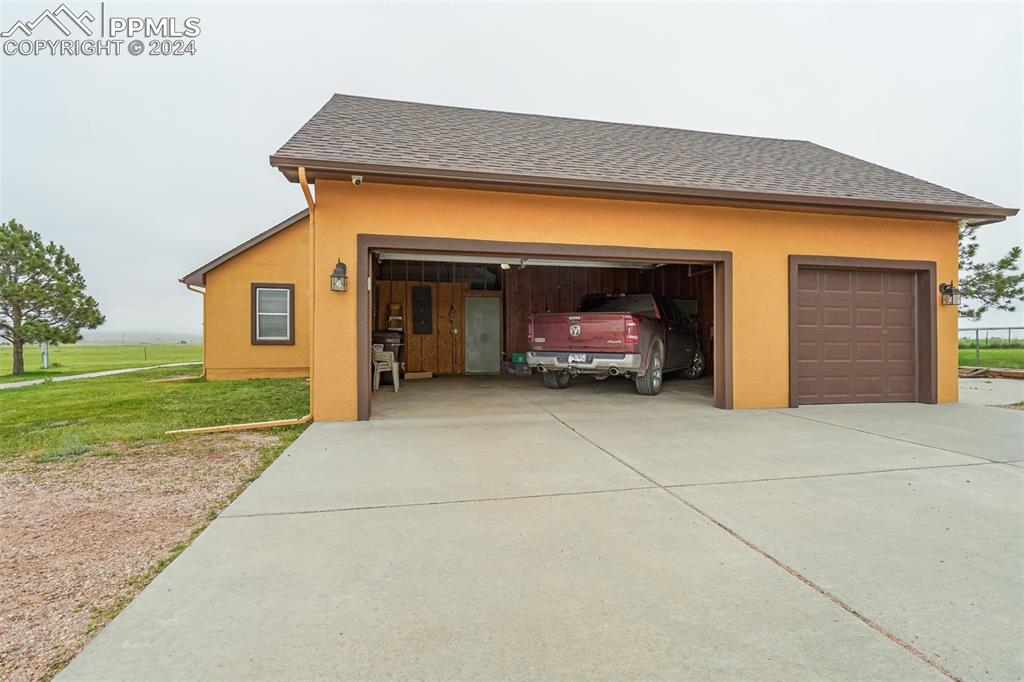 21445 Scott Road Calhan, CO 80808 - Photo 42 of 50 a view of outdoor space yard and garage